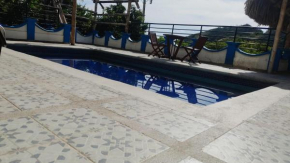 Pluma House Hostal